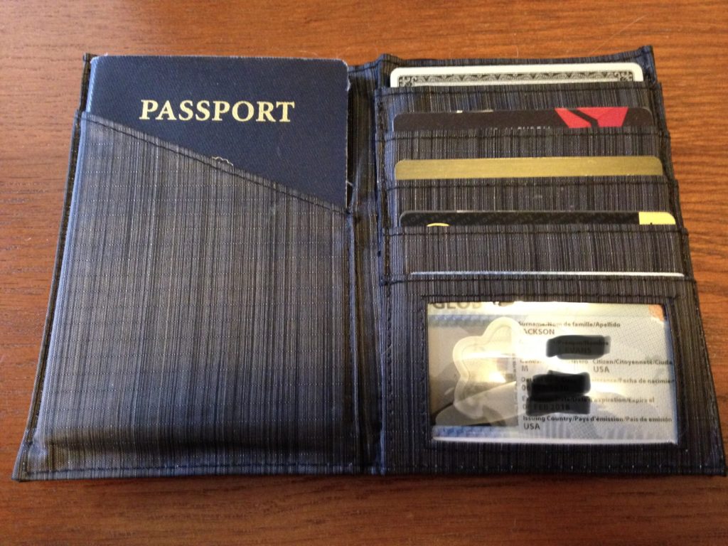 a wallet with cards and a passport