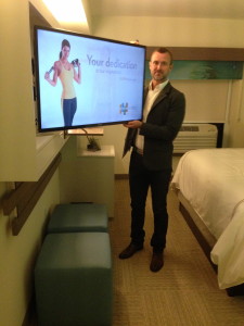 Scott Blakeslee shows us special workout programming on a guestroom TV at IHG's new EVEN hotel in Rockville, Md. All photos by Barb DeLollis. 
