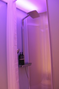 A shower with mood lighting at the citizenM in New York. Photo by Barb DeLollis.