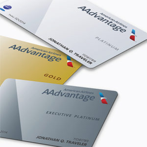 several credit cards on a white surface